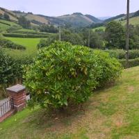 Views of the surrounding valley and hills at Drainbyrion Farm Self Catering.