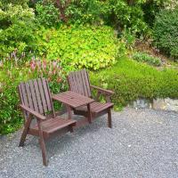 Seating in the accommodations garden where you can enjoy a glass of wine, read a book, or just enjoy the peace and quiet.