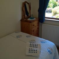 Smaller room with 4ft double and views of the garden.