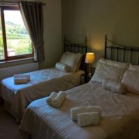 Family room with dual aspect, double and single beds.