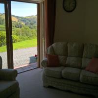 Holiday Letting lounge with views of the valley.