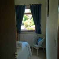 Holiday Letting small bedroom with garden views.