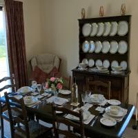 Family dining room with dual aspect views.